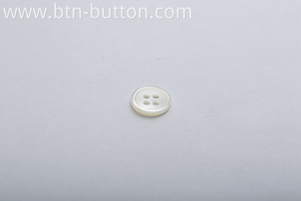 Multi-color optional four-hole shell button